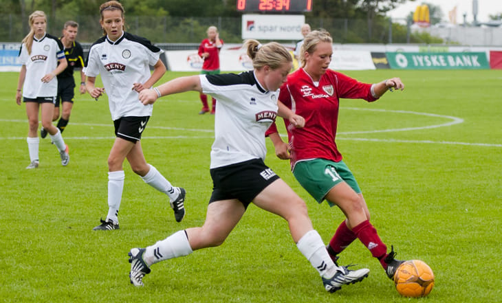 Girls fighting for the ball while playing in the Dana Cup